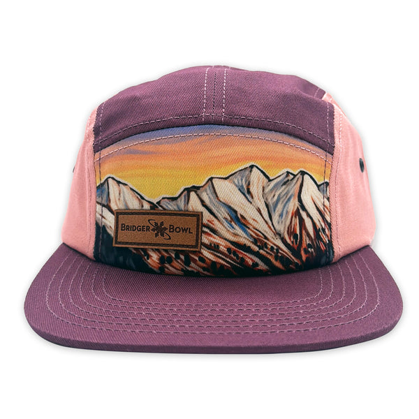 Cap with mountain design and 'Bridger Bowl' logo on a white background