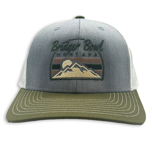 Gray and green cap with mountain design and text on a white background